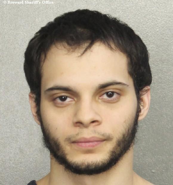 This booking photo provided by the Broward Sheriff's Office shows suspect Esteban Ruiz Santiago, 26, Saturday, Jan. 7, 2017, in Fort Lauderdale, Fla. (Broward Sheriff's Office via AP)