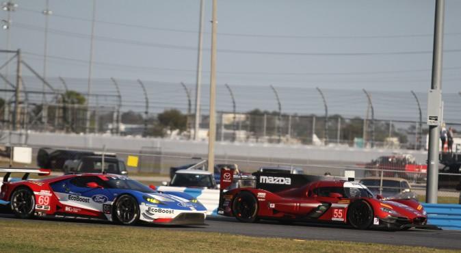 Mazda brought both its new Mazda RT24-P DPis to the Roar, the #55 resplendent in red while the #70 was cloaked in titanium silver. While beautiful, both cars lost time to electrical and mechanical issues. (Chris Jasurek/Epoch Times)