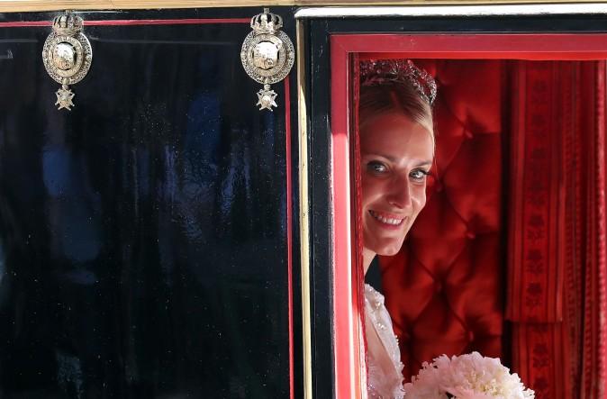 Ekaterina of Hanover in a carriage after her church wedding ceremony in Hanover, central Germany, on July 8, 2017.<br/> Prince Ernst August of Hanover did not give in to the injunctions of his father and married his fiancee Ekaterina Malysheva, a fashion designer of Russian origin. (RONNY HARTMANN/AFP/Getty Images)