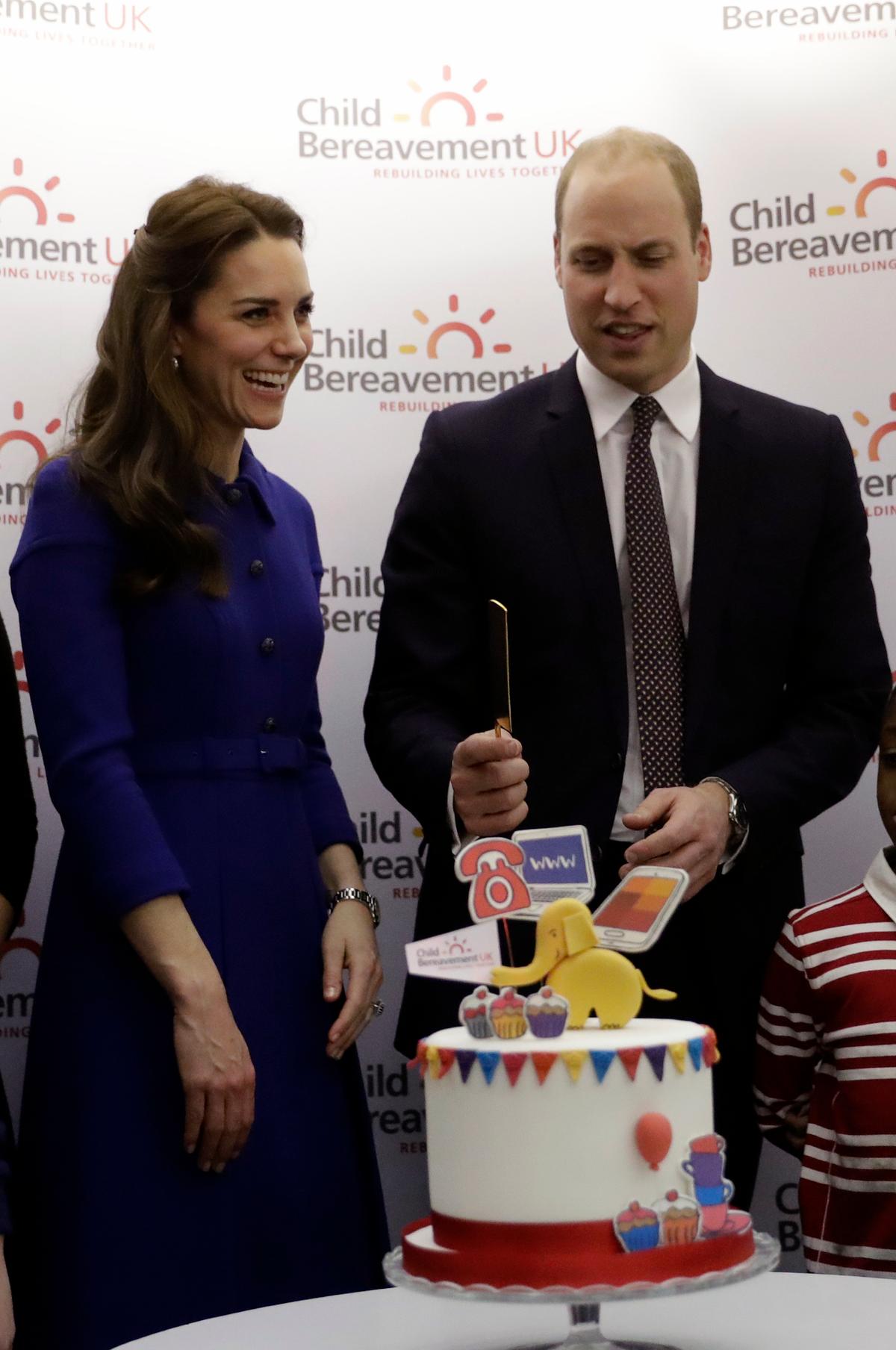 Britain's Prince William and his wife Kate the Duchess of Cambridge at a Child Bereavement UK Centre in Stratford in east London on Jan. 11, 2017. (AP Photo/Matt Dunham, Pool)