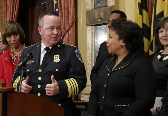 Baltimore Police Department Commissioner Kevin Davis, left, gives a thumbs up to Attorney General Loretta Lynch during a joint news conference in Baltimore, Thursday, Jan. 12, 2017, to announce his department's commitment to a sweeping overhaul of its practices under a court-enforceable agreement with the federal government.