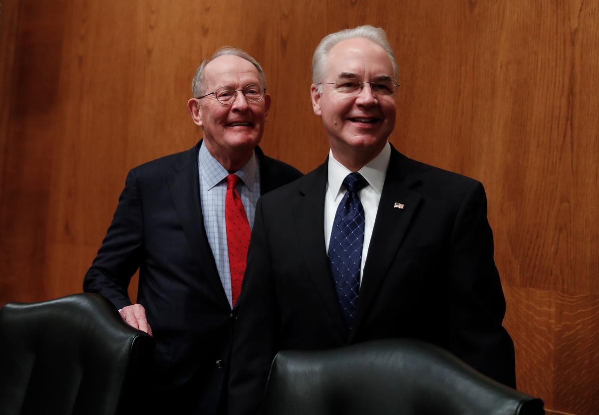 Senate Health, Education, Labor and Pensions Committee Chairman Sen. Lamar Alexander, R-Tenn. (L) stands with Health and Human Services Secretary-designate, Rep. Tom Price, R-Ga. on Capitol Hill in Washington on Jan. 18, 2017. (AP Photo/Carolyn Kaster)