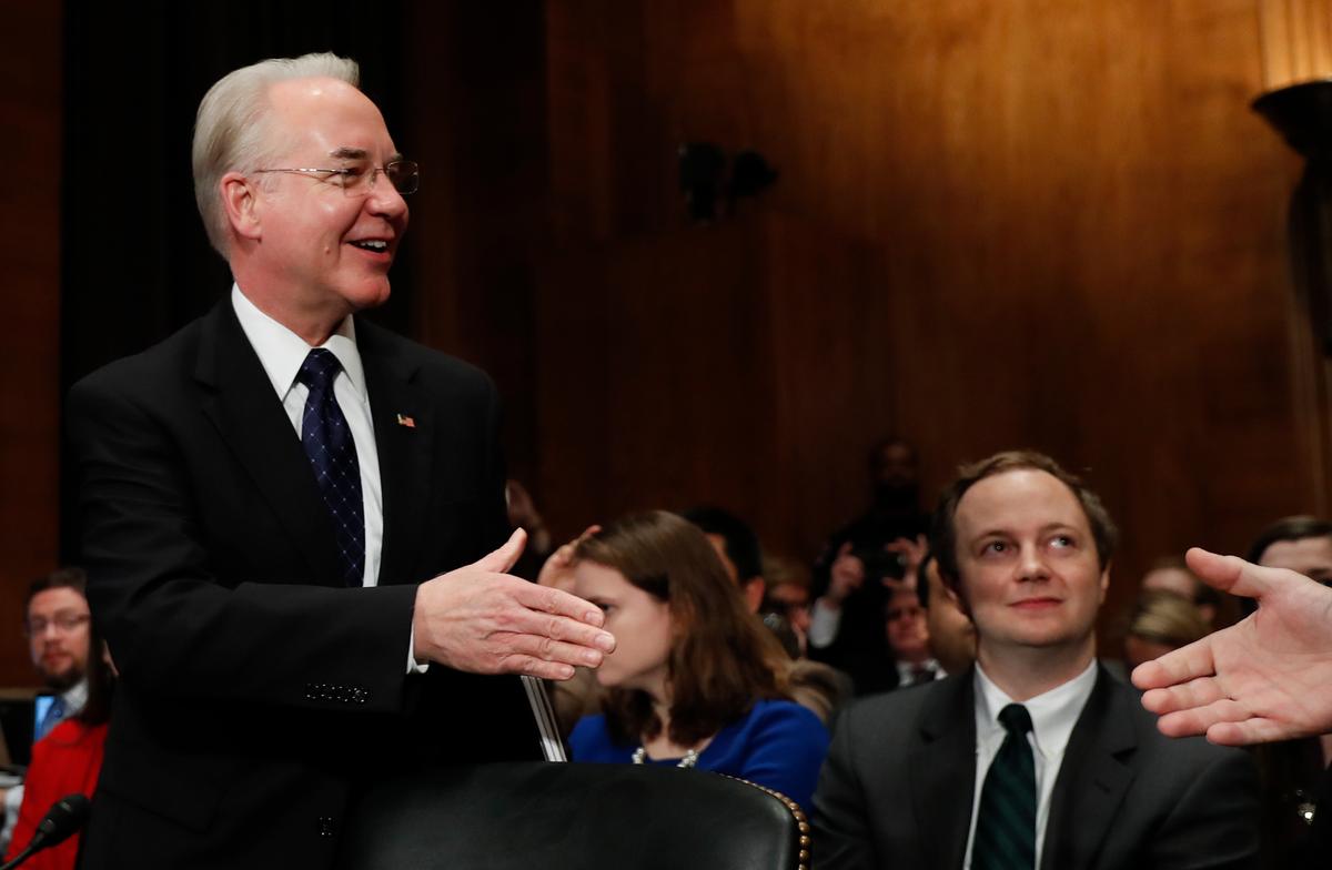 Health and Human Services Secretary-designate, Rep. Tom Price, R-Ga. (L) is greeted on Capitol Hill in Washington on Jan. 18, 2017, prior to testifying his confirmation hearing before the Senate Health, Education, Labor and Pensions Committee. (AP Photo/Carolyn Kaster)