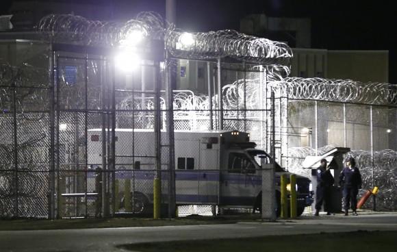 An ambulance exits the secure area after the execution of Ricky Gray at the Greensville Correctional Center in Jarratt, Va., on Jan. 18, 2017. (AP Photo/Steve Helber)