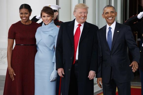 President Barack Obama, first lady Michelle Obama, President-elect Donald Trump and Melania Trump stand at the White House in Washington on Jan. 20, 2017. (AP Photo/Evan Vucci)