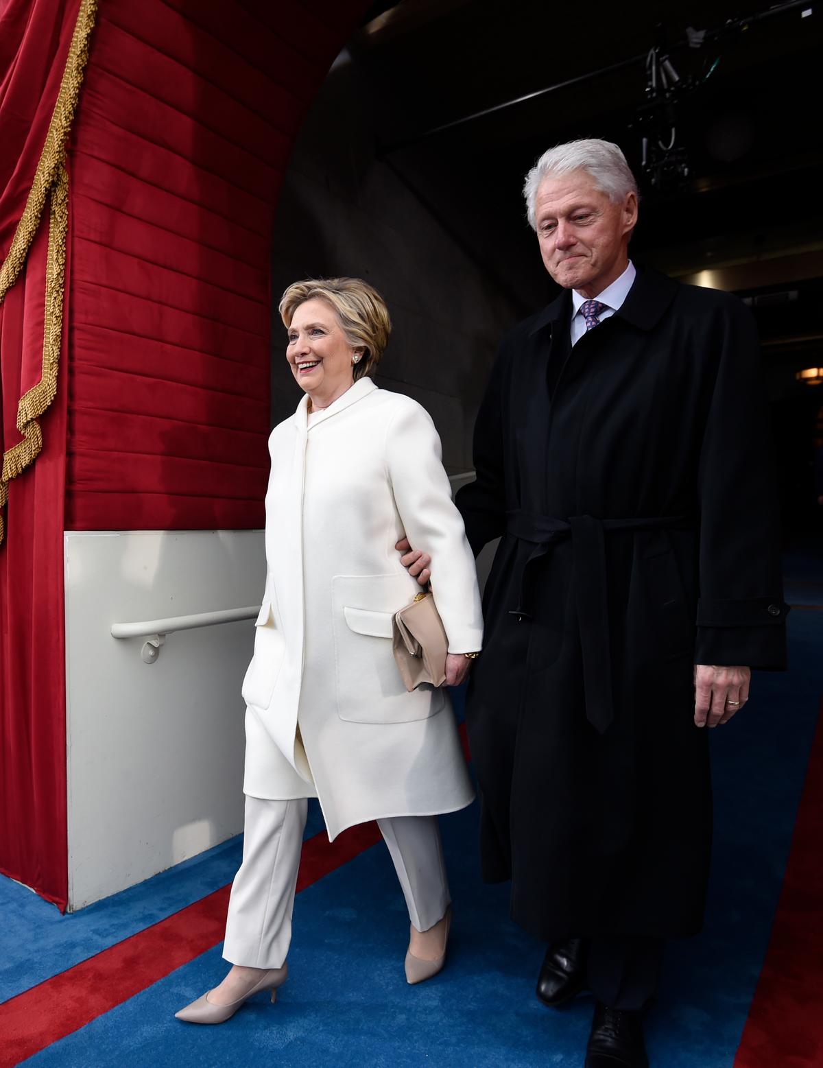 Former President Bill Clinton and his wife Hillary Clinton arrive on Capitol Hill in Washington on Jan. 20, 2017. (Saul Loeb via AP, Pool)