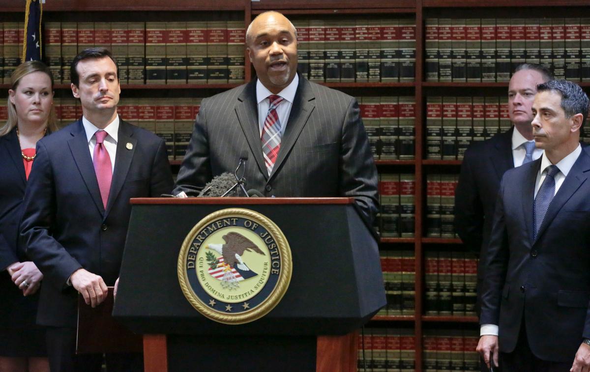 U.S. attorney Robert Capers (C) during a news conference, announcing charges for Mexican drug kingpin Joaquin "El Chapo" Guzman as the murderous architect of a three-decade-long web of violence, corruption and drug trafficking in the Brooklyn borough of New York on Jan. 20, 2017. (AP Photo/Mark Lennihan)