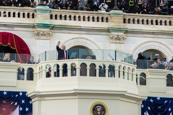 President Donald Trump waves after being sworn in as the 45th president of the United States at the U.S. Capitol in Washington, on Jan. 20, 2017. (Benjamin Chasteen/Epoch Times)