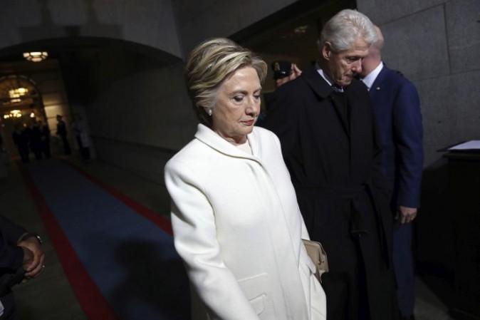Former Sen. Hillary Clinton and former President Bill Clinton arrive on the West Front of the U.S. Capitol on Friday, Jan. 20, 2017, in Washington, for the inauguration ceremony of Donald J. Trump as the 45th president of the United States. (Win McNamee/Pool Photo via AP)