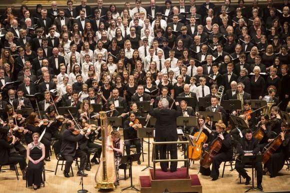 People sing "Aberfan: Cantata Memoria" by Sir Karl Jenkins with DCINY artistic director Jonathan Griffiths conducting, at Carnegie Hall in New York City on Jan. 15, 2017. (Samira Bouaou/Epoch Times)