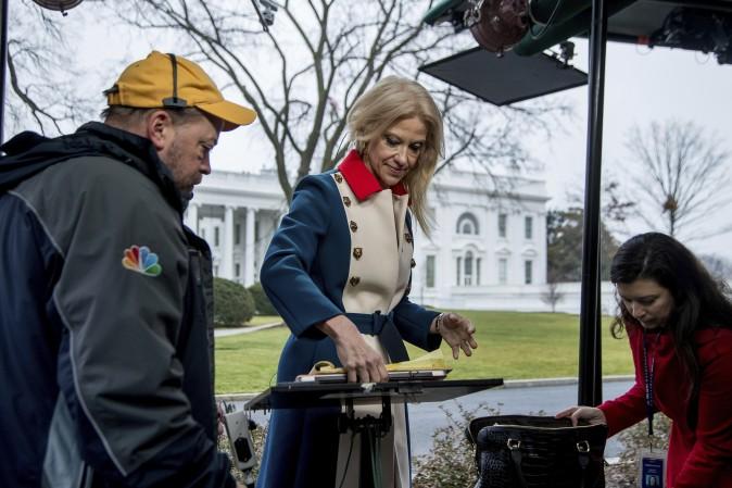 President Donald Trump's adviser Kellyanne Conway gets ready to go on television outside the White House, Sunday, Jan. 22, 2017, in Washington. (AP Photo/ Manuel Balce Ceneta)