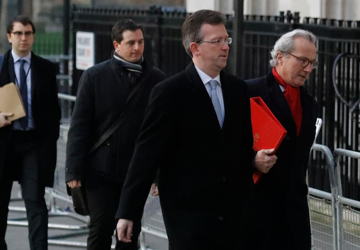Britain's Attorney General Jeremy Wright, second right, arrives at the Supreme Court in London on Jan. 24, 2017. (AP Photo/Frank Augstein)