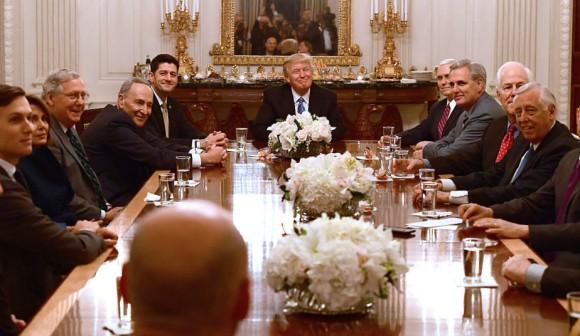 U.S. President Donald Trump (C) hosts a reception for House and Senate Republican and Democratic leaders in the State Dining Room of the White House in Washington, DC. on Jan. 23, 2017. (Ron Sachs-Pool/Getty Images)