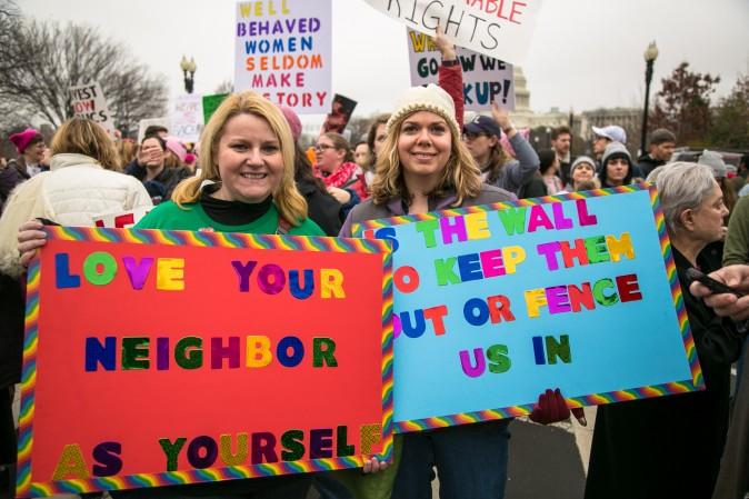 Amy Atkins (R) and Jennifer Suel at the Women's March on Washington on Jan. 21. (Benjamin Chasteen/Epoch Times)