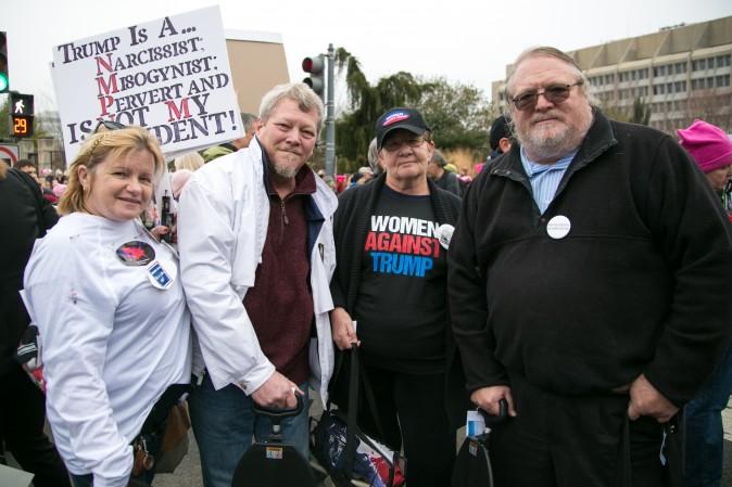 Kathy and Allen Jones from North Carolina (L) and Roger Jones and his wife from Florida at the Women's March on Washington on Jan. 21. (Benjamin Chasteen/Epoch Times)
