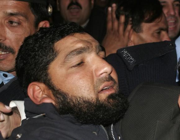 Mumtaz Qadri arrives at a court in Islamabad, Pakistan in this Jan 5, 2011 file photo. (AP Photo/B.K. Bangash)
