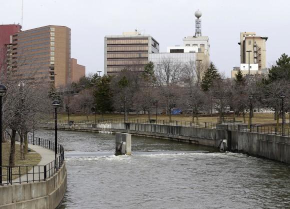 This Feb. 5, 2016, file photo, shows the Flint River in Flint, Mich. Michigan environmental officials announced Tuesday, Jan. 24, 2017, that Flint's water system no longer has levels of lead exceeding the federal limit. (AP Photo/Carlos Osorio)