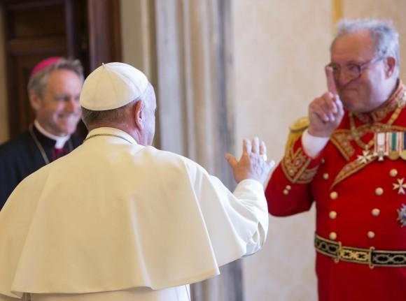 Pope Francis greets the Grand Master of the Sovereign Order of Malta Matthew Festing, right, at the end of a private audience in the Pontiff's private library at the Vatican on June 25, 2015. (AP Photo/Riccardo De Luca, File)