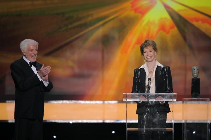 Dick Van Dyke presents the Life Achievement award onstage to Mary Tyler Moore at the 18th Annual Screen Actors Guild Awards in Los Angeles on Jan. 29, 2012. (AP Photo/Mark J. Terrill)