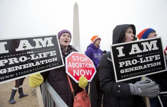 Michelle Doyle, left, joins the March for Life 2016 rally, commemorating the anniversary of 1973 "Roe v. Wade" U.S. Supreme Court decision legalizing abortion in Washington on Jan. 22, 2016. (AP Photo/Manuel Balce Ceneta, File)