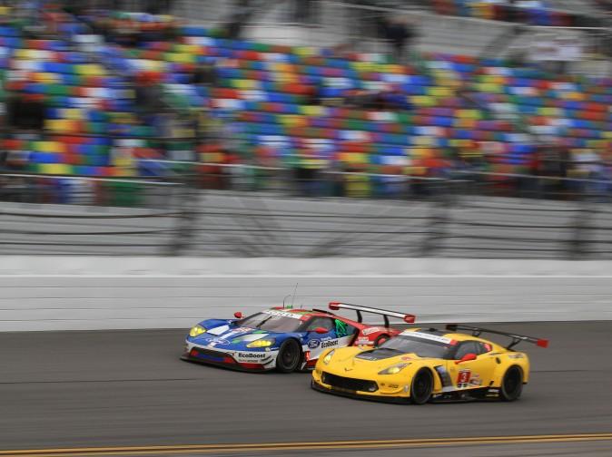 Olivier Pla in the #68 Ford and in the Jan Magnussen in the #3 Corvette duel on the front straight in the opening laps of the race. The battle has continued, with the addition of Ferrari. (Chris Jasurek/Epoch Times)
