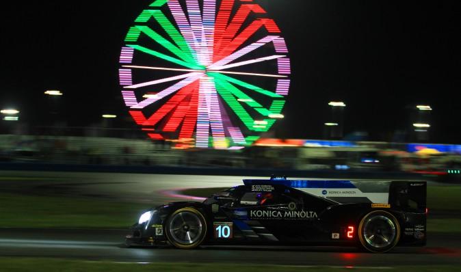 Ricky Taylor in the #10 WTR Cadillac enters the International Horseshoe at Daytona ten hours into the Rolex 24. (Chris Jasurek/Epoch Times)