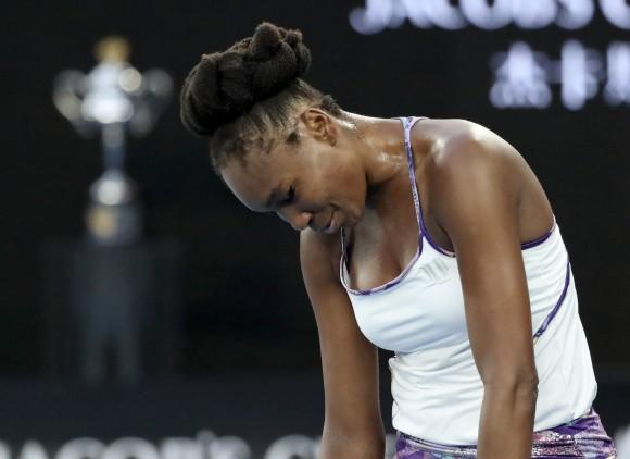 United States' Venus Williams reacts after losing a point to her sister Serena during the women's singles final at the Australian Open tennis championships in Melbourne, Australia, on Jan. 28, 2017. (AP Photo/Aaron Favila)