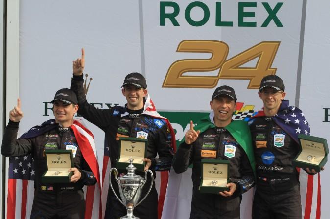 Jeff Gordon, Ricky Taylor, Max Angelelli, and Jordan Taylor celebrate winning the55th Rolex 24 at Daytona, Jan. 29, 2017. (Chris Jasurek/Epoch Times)