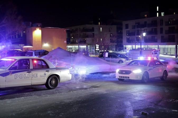 Police survey the scene after deadly shooting at a mosque in Quebec City, Canada, on Jan. 29, 2017. (Francis Vachon/The Canadian Press via AP)