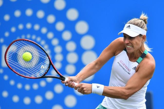 Germany's Angelique Kerber plays a shot against Spain's Lara Arruabarrena during their women's singles third round tennis match at the ATP Aegon International tennis tournament in Eastbourne, southern England, on June 29. (GLYN KIRK/AFP/Getty Images)
