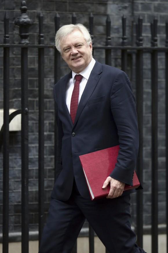 Britain's Brexit Secretary David Davis arrives for a Cabinet meeting at 10 Downing Street, London Jan. 31, 2017. British lawmakers are starting debate on a bill authorizing the start of European Union exit talks, as the government races to meet a self-imposed March 31 deadline to begin the process. (Yui Mok/PA via AP)