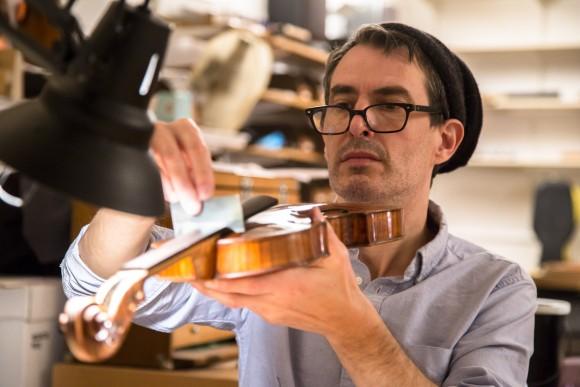 Michael Bourassa at the restoration shop of Rare Violins of New York in Manhattan, New York, on Jan. 9, 2017. (Samira Bouaou/Epoch Times)