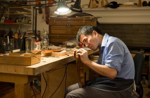 Tatsuo Imaishi at the restoration shop of Rare Violins of New York in Manhattan, New York, on Jan. 9, 2017. (Samira Bouaou/Epoch Times)