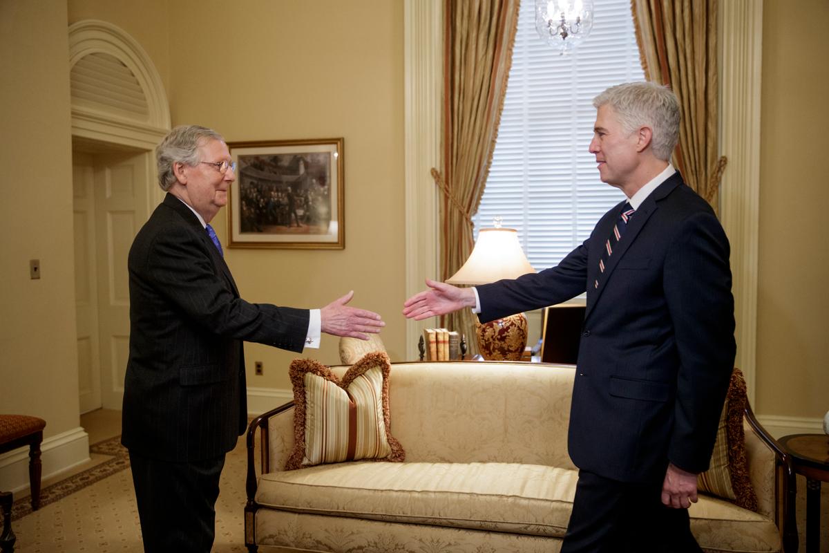 Supreme Court Justice nominee Neil Gorsuch is greeted by Senate Majority Leader Mitch McConnell of Ky. on Capitol Hill in Washington on Feb. 1, 2017. (AP Photo/J. Scott Applewhite)