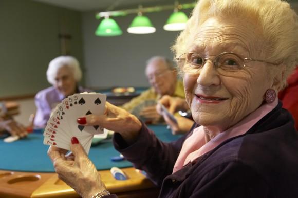 Playing bridge and socializing can stave off mental decline (Monkey Business Images/Shutterstock)