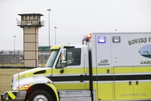 More ambulances arrive on scene as all Delaware prisons went on lockdown at the James T. Vaughn Correctional Center in Smyrna, on Feb. 1, 2017. (Suchat Pederson/The Wilmington News-Journal via AP)