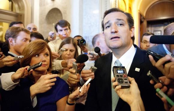 Senator Ted Cruz, R-Tex., speaks to reporters after ending his talk-a-thon on the floor of the US Senate in Washington on Sept. 25, 2013. Cruz ended his overnight protest against Obamacare after a 21-hour speech. (JIM WATSON/AFP/Getty Images)