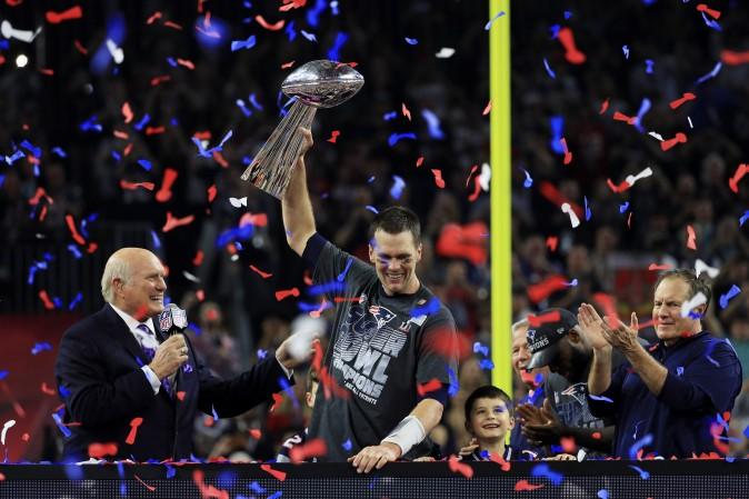 Tom Brady of the New England Patriots holds the Vince Lombardi Trophy after defeating the Atlanta Falcons 34-28 in overtime during Super Bowl 51 at NRG Stadium in Houston on Feb. 5. (Mike Ehrmann/Getty Images)