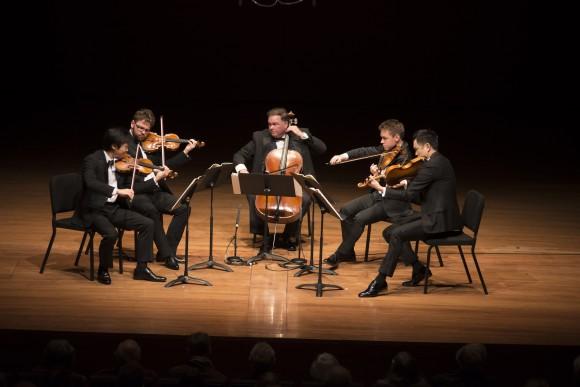 (L-R) Violinists Sean Lee and Alexander Sitkovetsky; cellist Keith Robinson; and violists Matthew Lipman and Richard O'Neill perform at Alice Tully Hall. (Tristan Cook.)