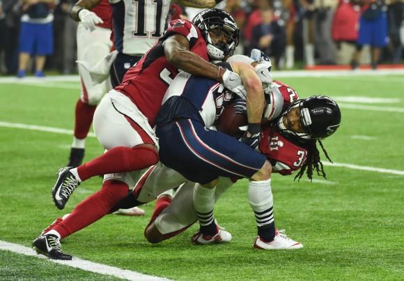 Danny Amendola #80 of the New England Patriots scores a two point conversion late in the fourth quarter against Jalen Collins #32 and Brian Poole #34 the Atlanta Falcons during Super Bowl 51 at NRG Stadium in Houston, Texas on Feb. 5, 2017. (TIMOTHY A. CLARY/AFP/Getty Images)