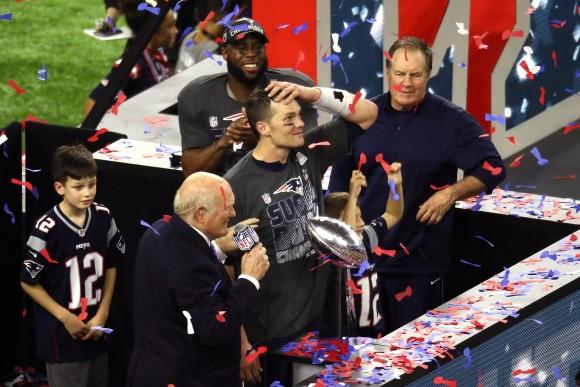 Tom Brady #12 of the New England Patriots celebrates with the Vince Lombardi Trophy after defeating the Atlanta Falcons during Super Bowl 51 at NRG Stadium in Houston, Texas on Feb. 5, 2017. The Patriots defeated the Falcons 34-28. (Ezra Shaw/Getty Images)