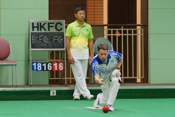 Hong Kong Football Club skipper Neil Herrington deliver his last bowl to round up an impressive win against Hong Kong International Li Ming Sum. (Mike Worth)