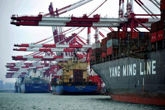 Abusive trade practices by the Chinese state-owned enterprises have inflicted significant harm on American companies and will be dealt with by the Trump administration, according to U.S. Trade Representative Robert Lighthizer. Showing cargo ships berthed at a port in Qingdao, China. (STR/AFP/Getty Images)