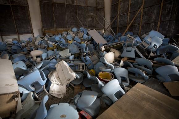 This Feb. 2, 2017 photo shows seats jumbled in a pile inside Maracana stadium in Rio de Janeiro, Brazil. (AP Photo/Silvia Izquierdo)