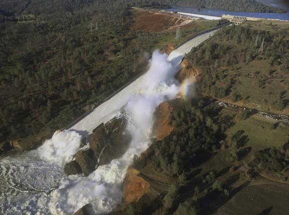 The damaged spillway with eroded hillside in Oroville, Calif., on Feb. 11, 2017. (William Croyle/California Department of Water Resources via AP)