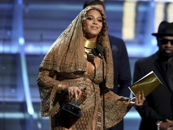 Beyonce accepts the award for best urban contemporary album for "Lemonade" at the 59th annual Grammy Awards on Sunday, Feb. 12, 2017, in Los Angeles. (Photo by Matt Sayles/Invision/AP)