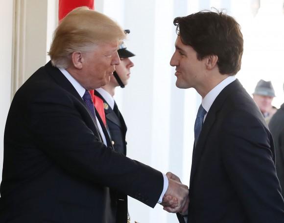 President Donald Trump (L), greets Canadian Prime Minister Justin Trudeau at the White House in Washington on Feb. 13, 2017. Later in the day the two leaders are scheduled to speak to the media at a news conference. (Mark Wilson/Getty Images)