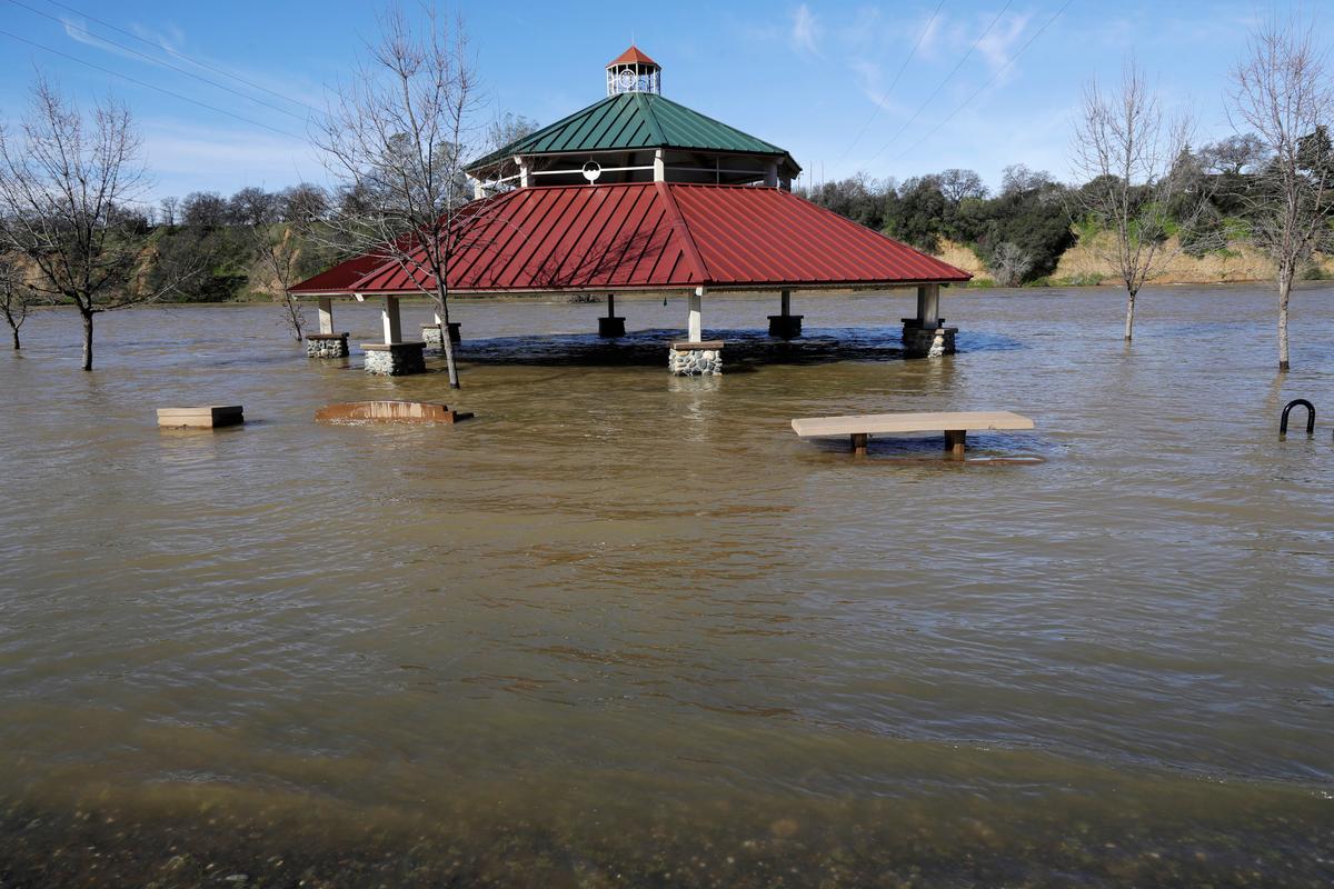 A gazebo is submerged from the overflowing Feather River downstream from a damaged dam at Riverbend Park in Oroville, Calif., on Feb. 14, 2017. (AP Photo/Marcio Jose Sanchez)