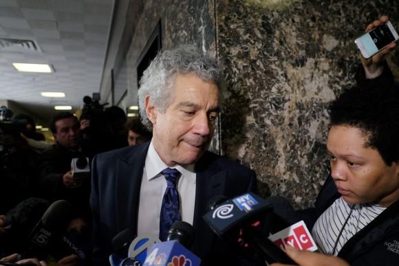 Pedro Hernandez's defense lawyer Harvey Fisbein (C) makes his way past journalists at a court in New York at the lunch break of his client's trial in accusation of kidnapping and killing six-year-old Etan Patz in one of America's most famous missing child cases on Jan. 30, 2015. (JEWEL SAMAD/AFP/Getty Images)
