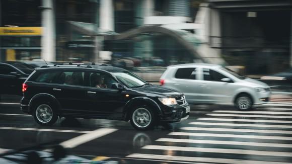 Black SUV beside crossing the pedestrian line during daytime (File Photo)
